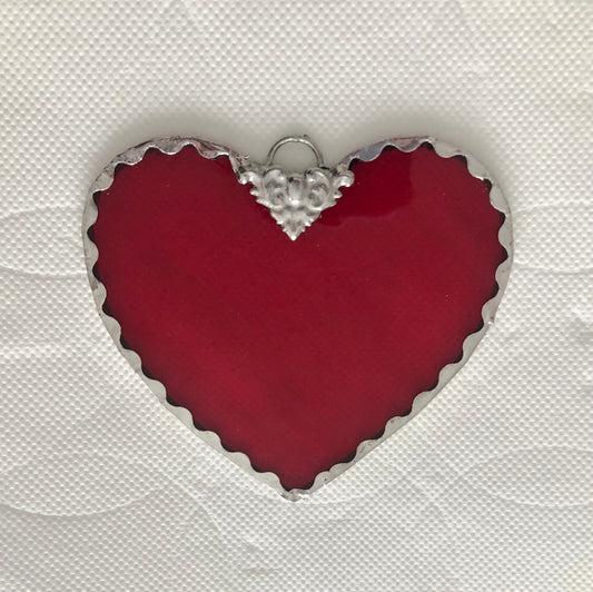 Beautiful Stained Glass Heart Ornament. Ornament is 3.5 inch tall by 3.5 inches wide.