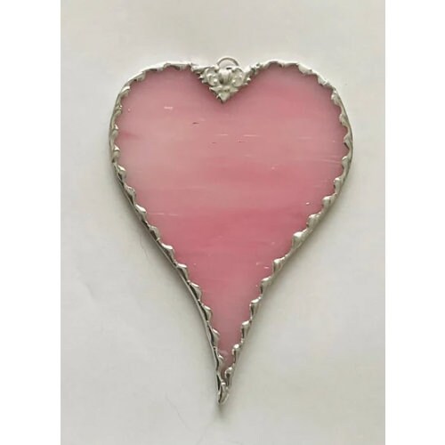 Beautiful heart-stained glass ornament. Give a gift of love with a stained glass heart ornament.